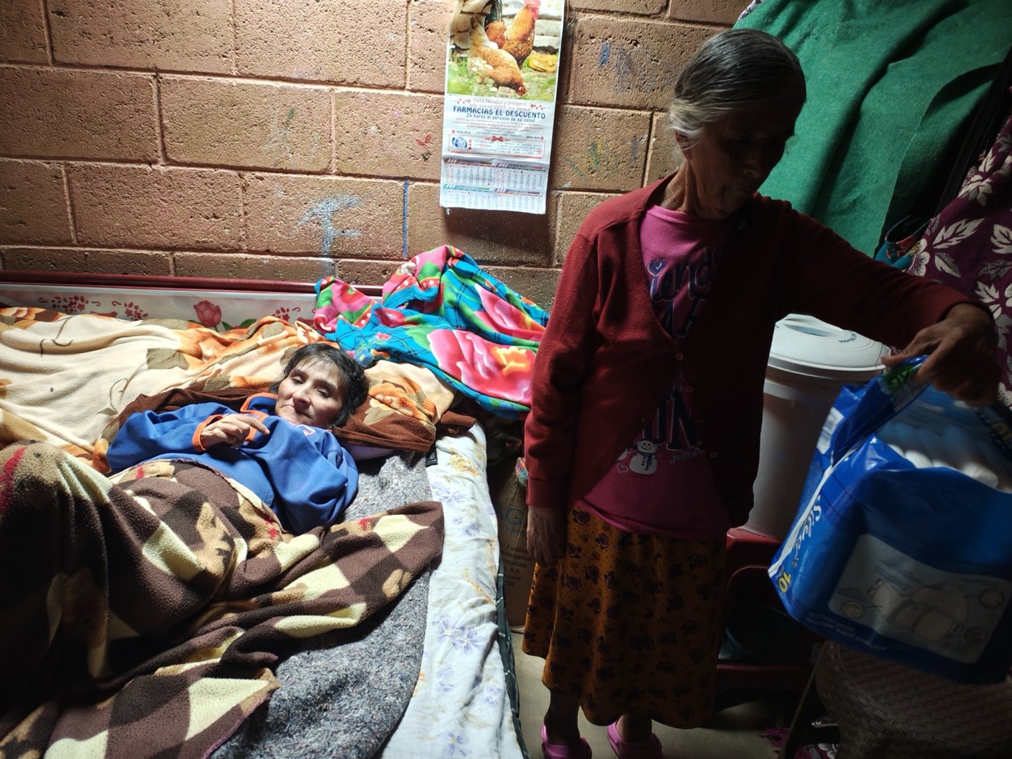 Visita de acompañamiento a una persona mayor en su hogar en Huehuetenango